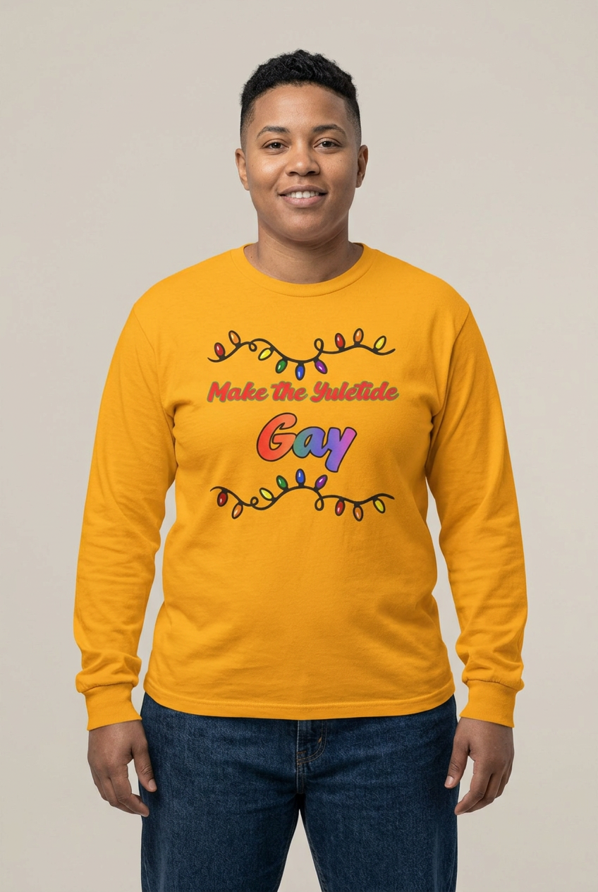 Butch female model wearing the Gold Yuletide Gay tee