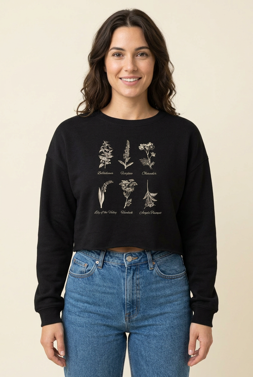 Female model wearing the black Botanical Wildflower Sketches Crop Sweatshirt