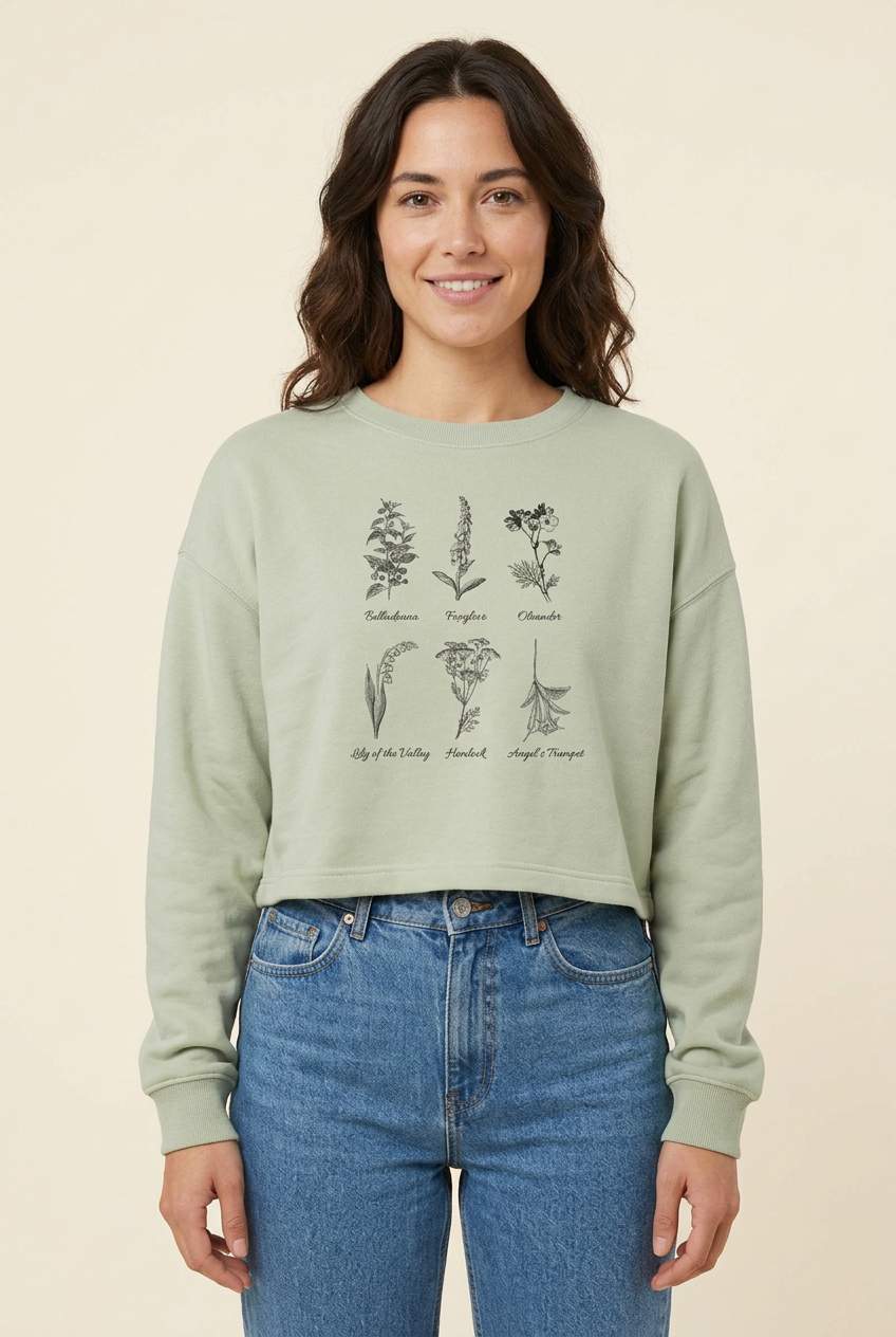 Female model wearing the matcha Botanical Wildflower Sketches Crop Sweatshirt